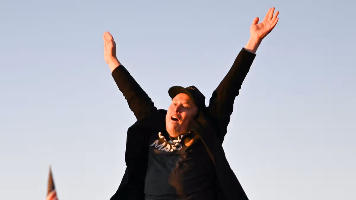 Elon Musk jumping in elation after introducing his new DieselTruck